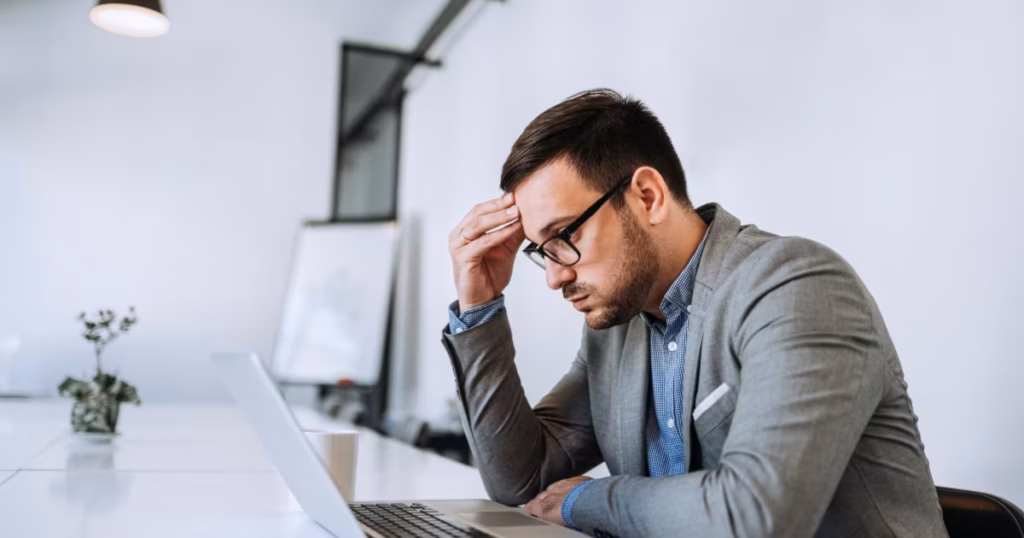 A man looking frustrated, illustrating how ADHD medication feels ineffective ADHD medication near me.