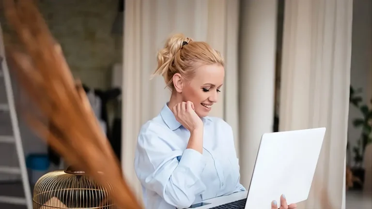 Person researching how to choose a mental health provider on a laptop in 2026.